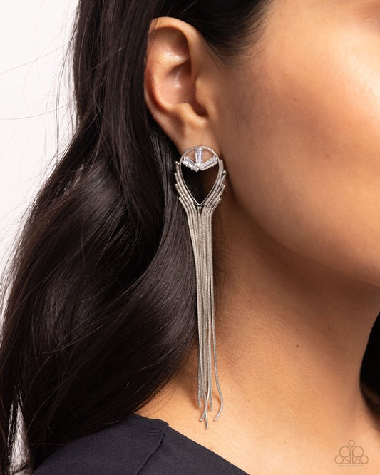 Elongated white earrings